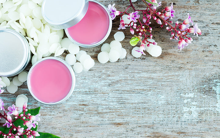 homemade natural lip balm in tin pots